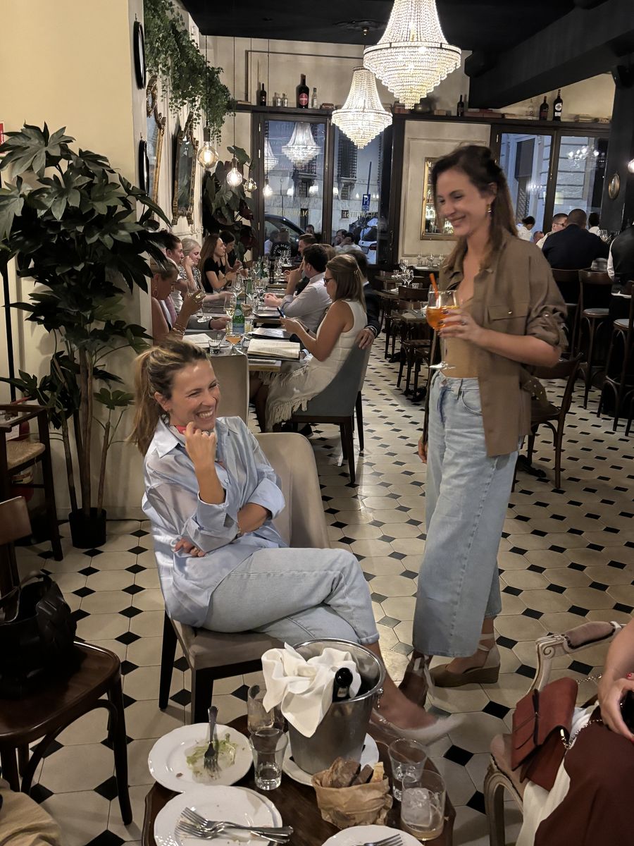 Laughing over dinner in a restaurant